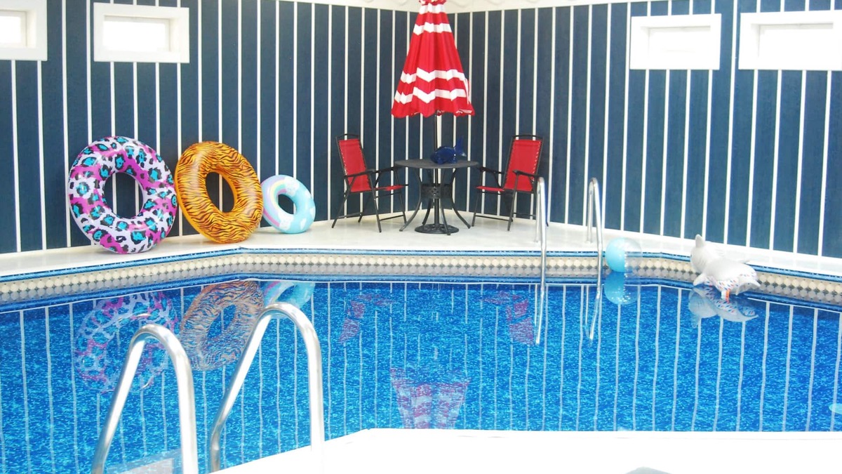 Eau Claire House | Spacious family friendly home with a heated indoor pool