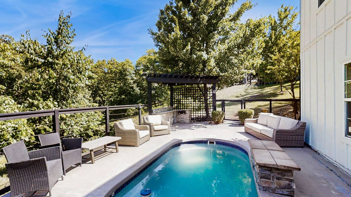 Rogers House | Spacious family retreat w/pool, BBQ grill, patio, deck, near Beaver Lake