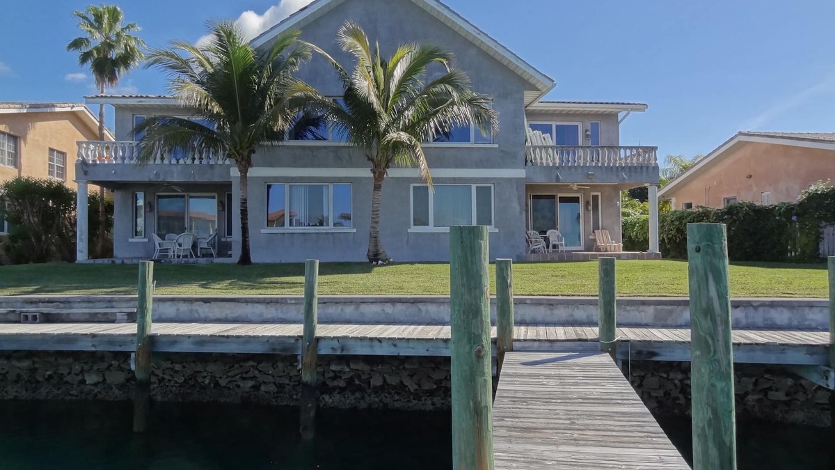 Bahamia West Condo | Spacious Gated Waterfront Villa with Private Dock