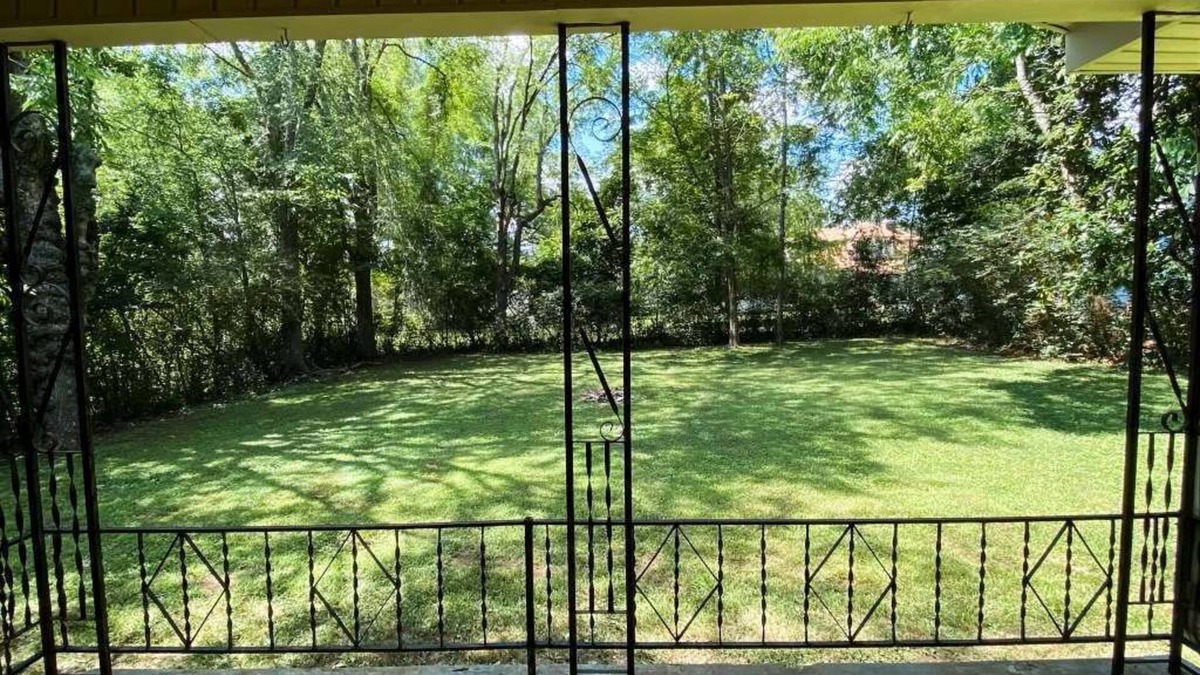 Parsons House | Spacious home in downtown Parsons! Conference room, HS internet, & private yard