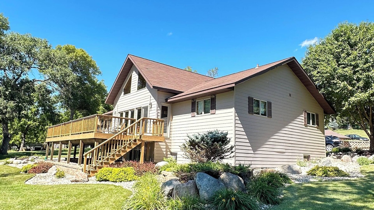 Ortonville House | Spacious home with a large deck and ample space for beautiful sunset viewing!