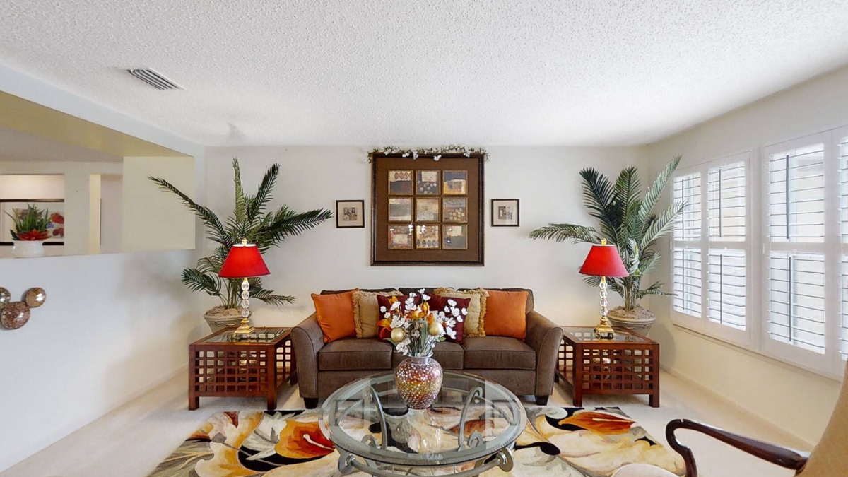 Westside House | Spacious home with sunroom, patio, fireplace, & water views