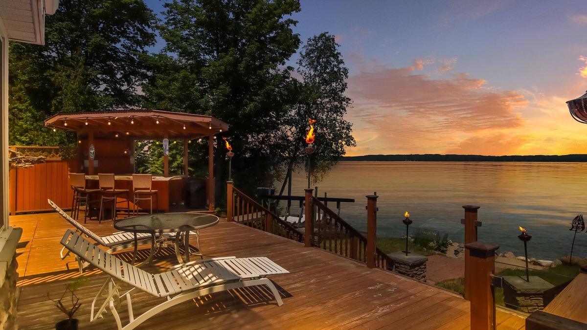 Williamsburg House | Spacious LAKE FRONT home w/100' DOCK & Hot tub on Elk Lake mins to TORCH LAKE