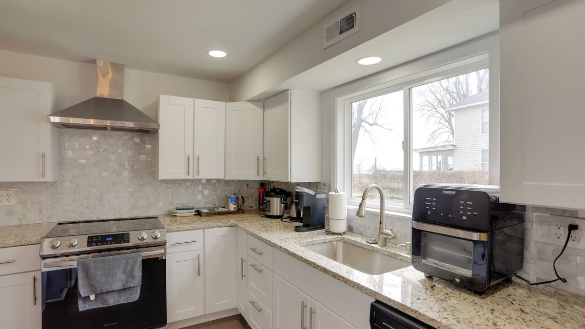 Woodland Beach Cottage | Spacious Lakefront House w/Backyard Fire Pit