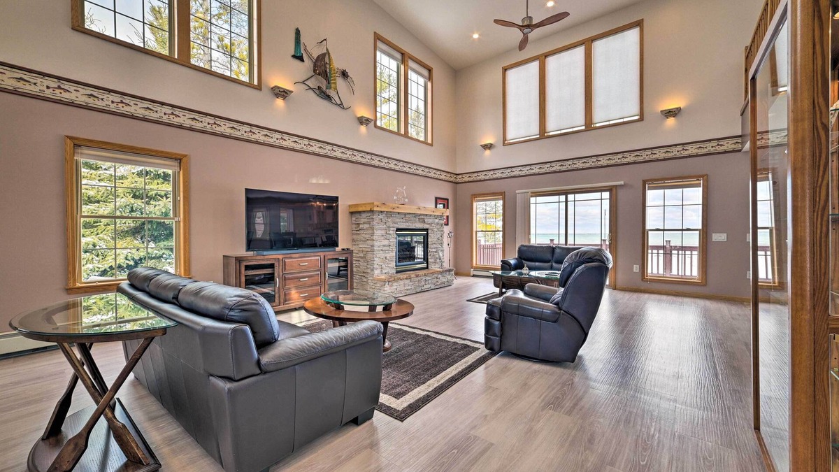 Rogers City House | Spacious Lakefront Home w/Sunroom & Bar!