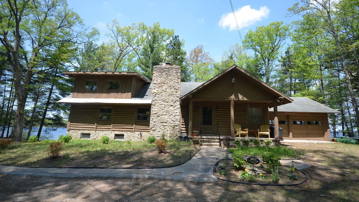 Interlochen Cabin | Spacious log home on Green Lake. Waterfront. Dog ok.