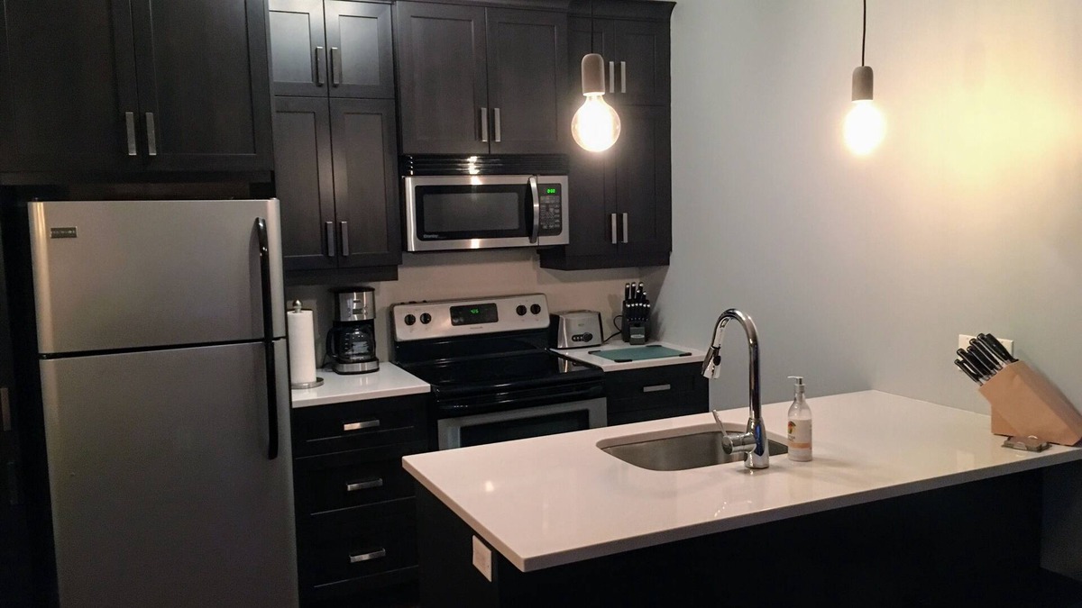 Bromont Condo | Spacious Mountain View Condo Heated Pool & BBQ - Ski, Golf, Cycling, Water Park