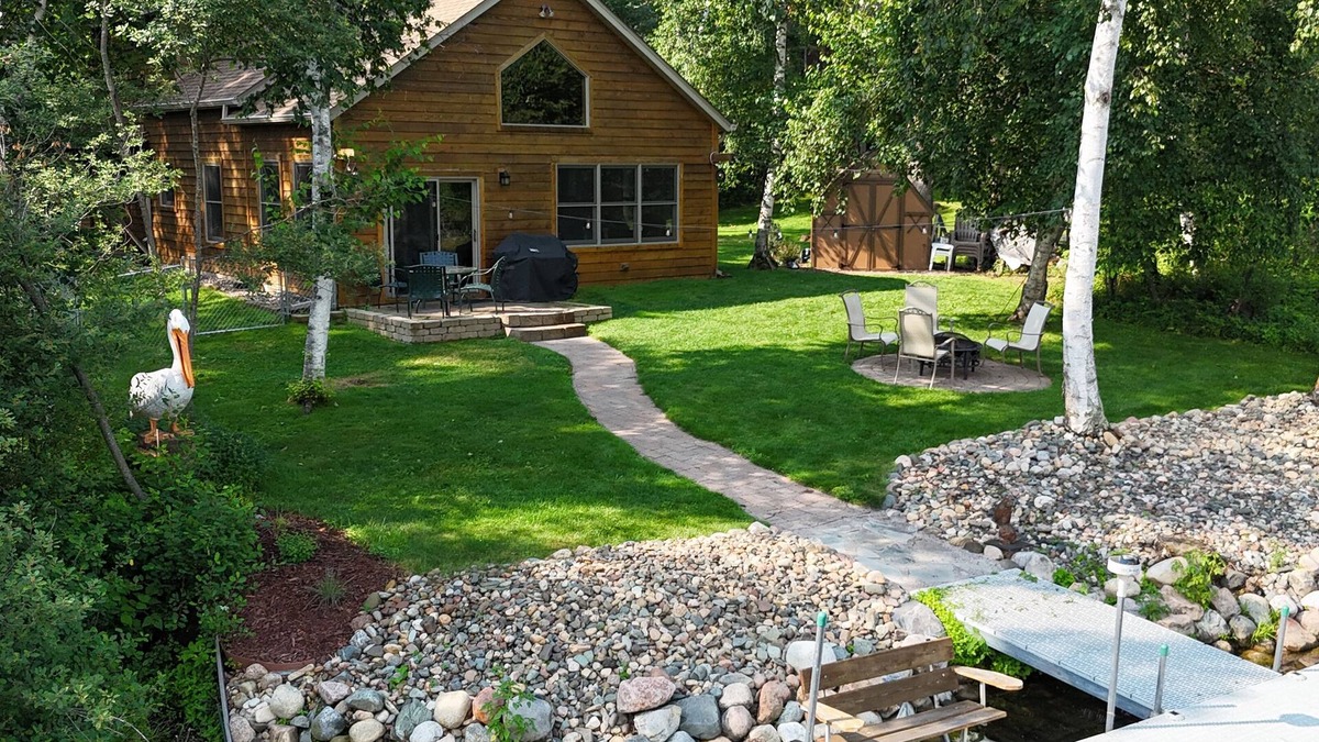 Breezy Point House | Spacious Summer Escape: Private Backyard, Dock & Fire Pit, Channel Waterfront