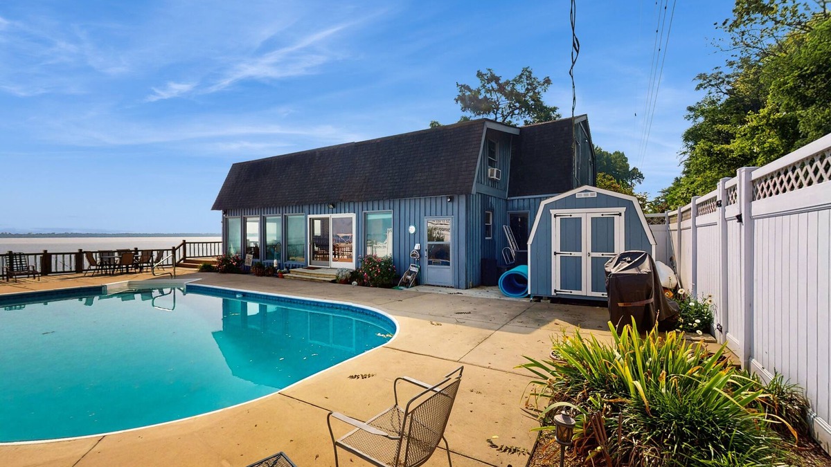Avoca House | Spacious waterfront house with private heated seasonal pool + dock