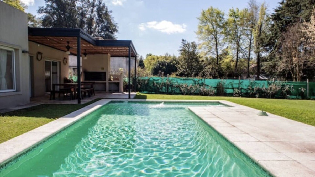 Del Viso Ski Chalet | Special home for Holidays pool and green park