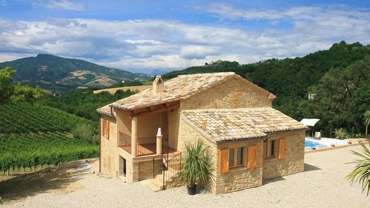 Porchia House | Spectacular views across the pool to mountains and historic village.