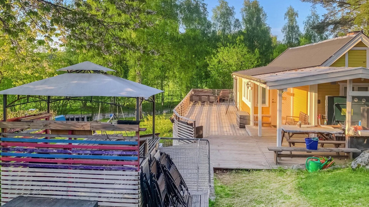 Sodertalje House | Spend an unforgettable vacation near the lake in this inviting vacation home.