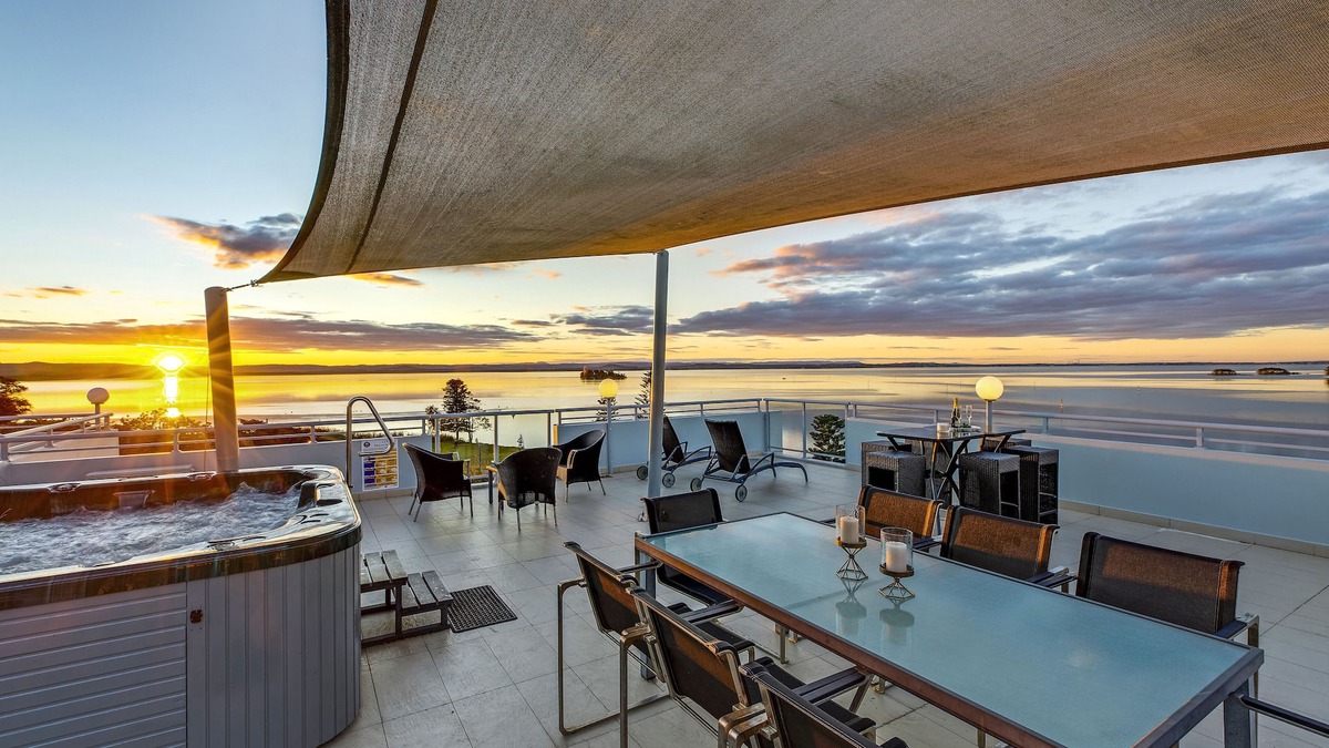 The Entrance Apartment | Spiral staircase to 2 level rooftop Penthouse with Hot spa & BBQS