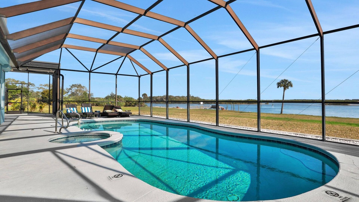 Edgewater House | Sprawling intercoastal home with boat lifts, pool and hot tub