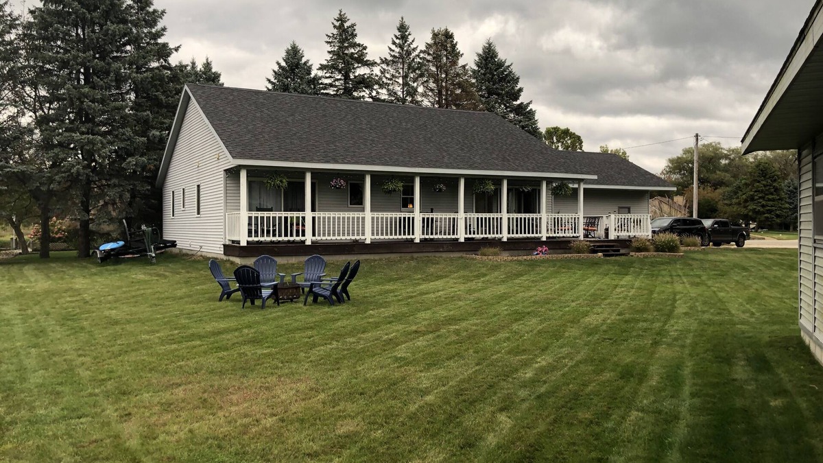 Ferrysburg House | Spring Lake waterfront home on Markers Cove with full Spring Lake access!