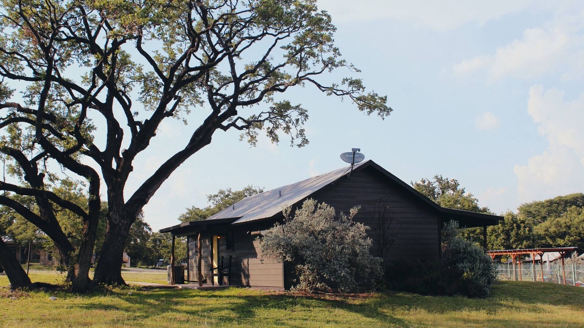 Leakey Cabin | Springs Cabin located near the pool area.