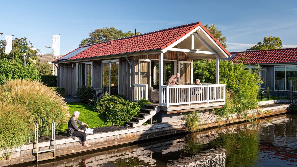 Akkrum House | Stay in our cozy Meine 4 chalet with private jetty.