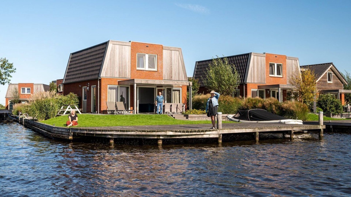 Akkrum House | Stay in our spacious Sneekermeer 8 home with private jetty.