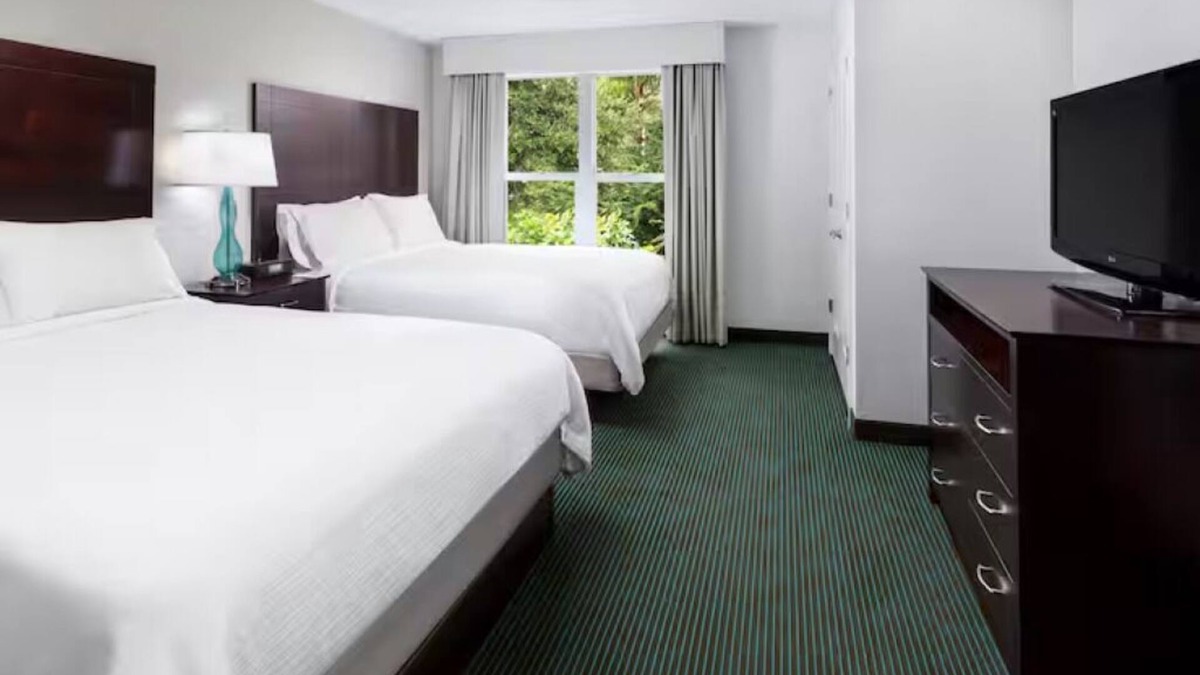 Florida Central Atlantic Coast Hotel | Stay Near Disney: 2 Resort Suites w/Pools, Free Shuttle & Breakfast