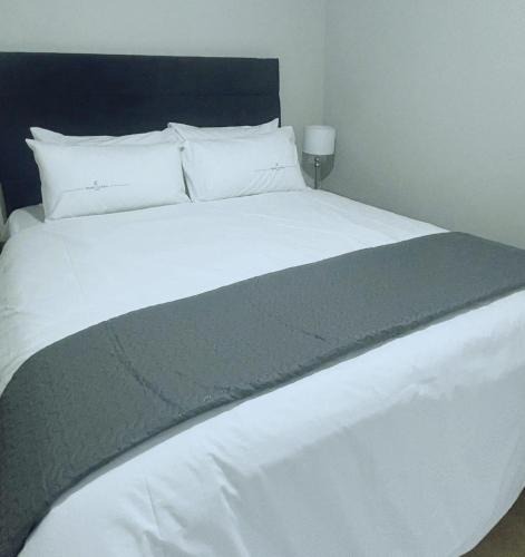 Musgrave House | Stay-Tiah Grey Room