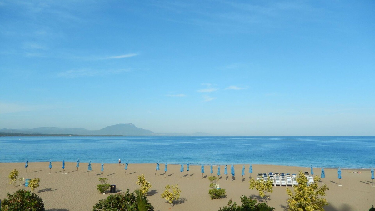 El Batey Apartment | Steps from Sandy Beach, Central 2BD Condo, Pool, Internet/Cable TV, AC, Balcony
