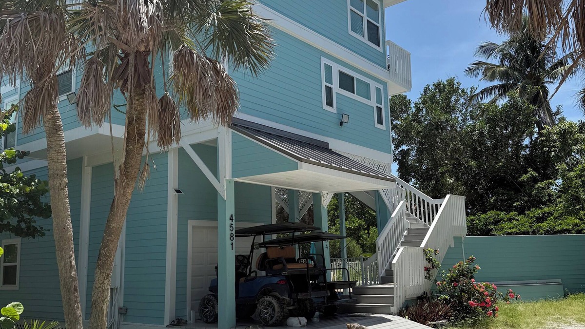 Jose's Hideaway House | Steps from the beach! Spacious island retreat with pool, grill, and space for 12
