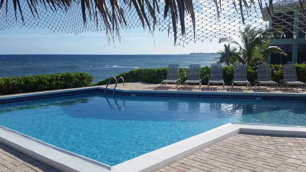 North Side Condo | Steps to Sand & Sea - Oceanfront Condo with Pool in Quiet Cayman Kai/Rum Point