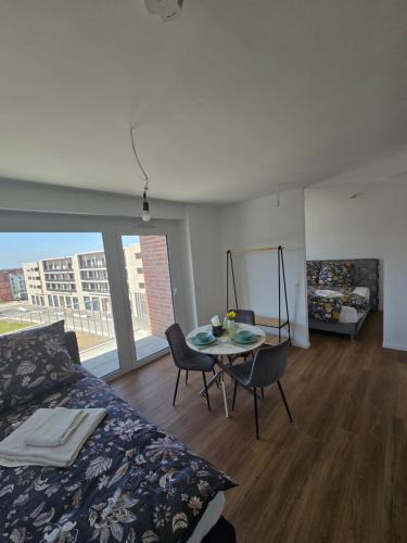 Kirchrode-Bemerode-Wulferode Apartment | Stilvolle Neubauwohnung mit Balkon&WLAN