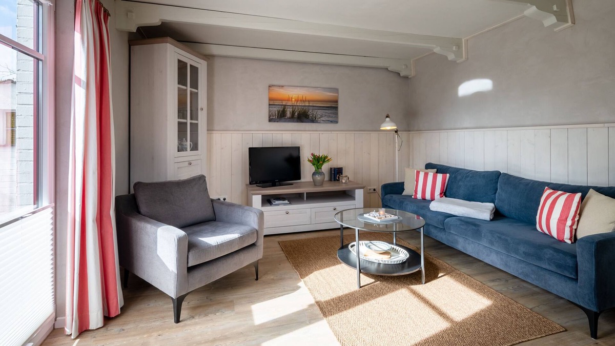 Suederhafen Apartment | Stilvolles Kapteins Cottage mit Kamin - Inge