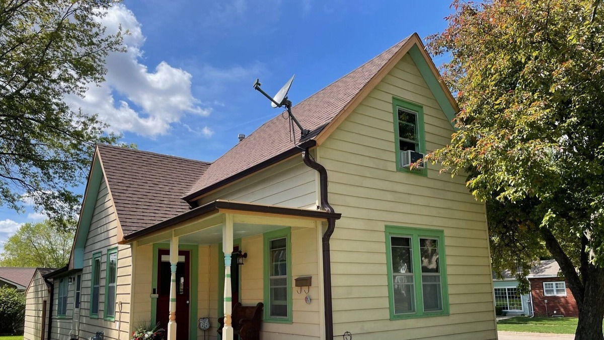 Pella House | Story and a half home less than a block from Pella's town square.