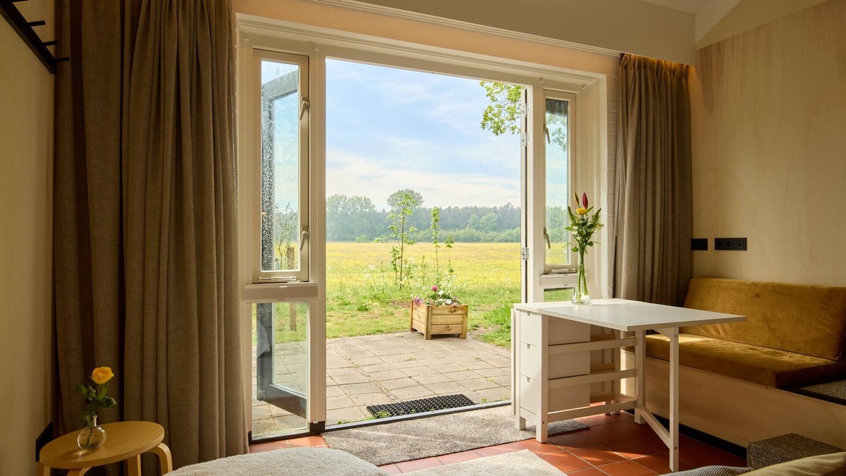 Castricum Apartment | Studio apartment with unobstructed view of meadows and forests near the beach.