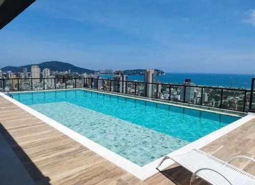 Enseada Apartment | Studio Guarujá, vista ao mar