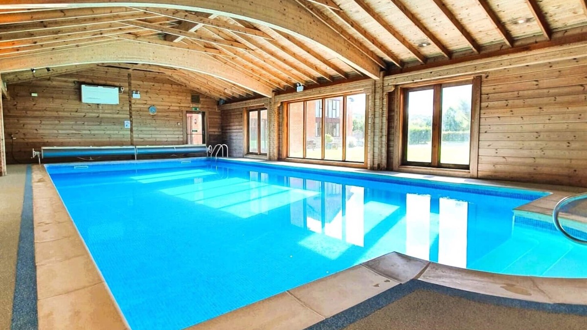 Woolland House | Stunning Barn Conversion with Exclusive Bar, Pool, Hot Tub & Countryside Charm