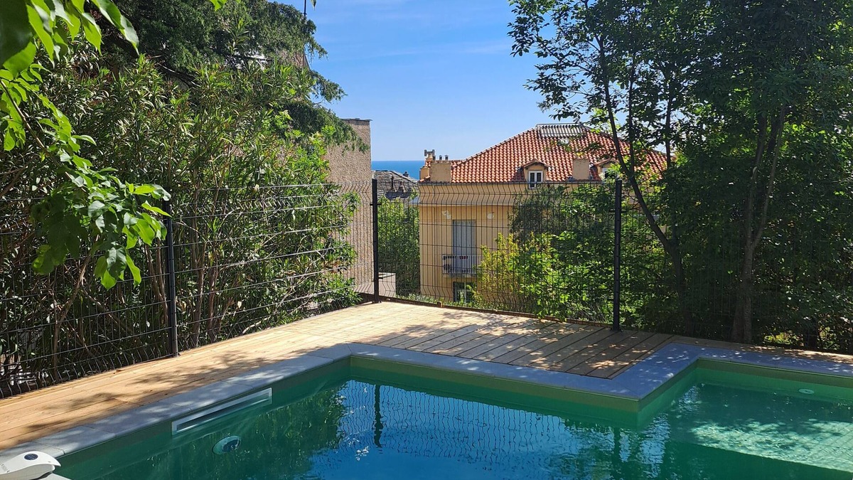 Bastia House | Stunning 19th century Maison de Maître with sea view swimming pool in garden centre ville