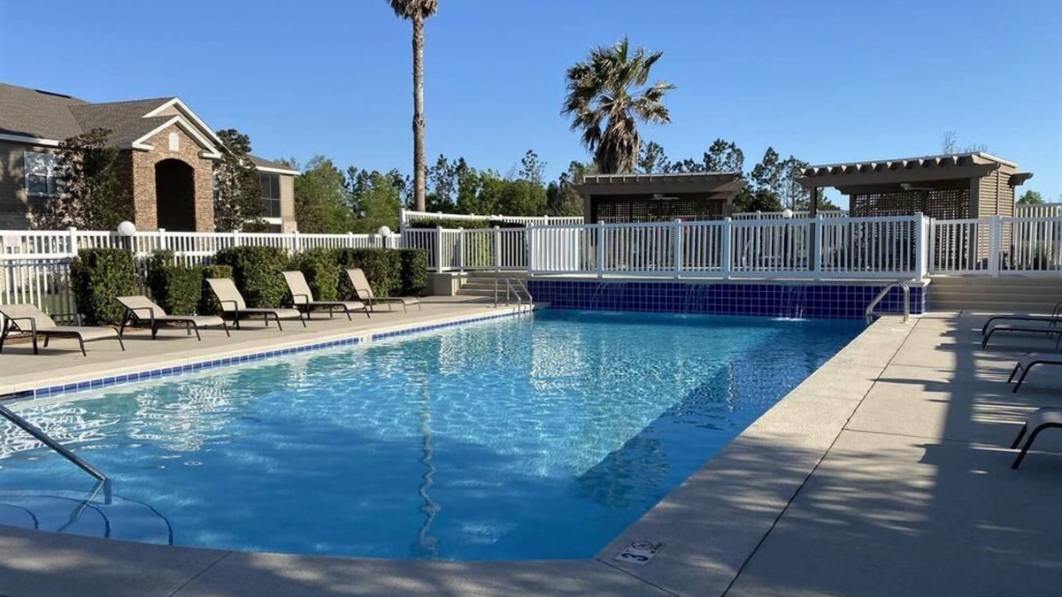Foley Condo | Stunning 3BR, 2BA luxury retreat with pool view, just 7 miles from the beach!