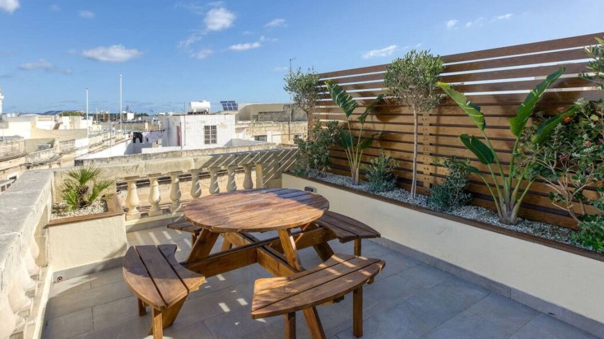 Paola House | Stunning 3BR Townhouse with Private Rooftop Access