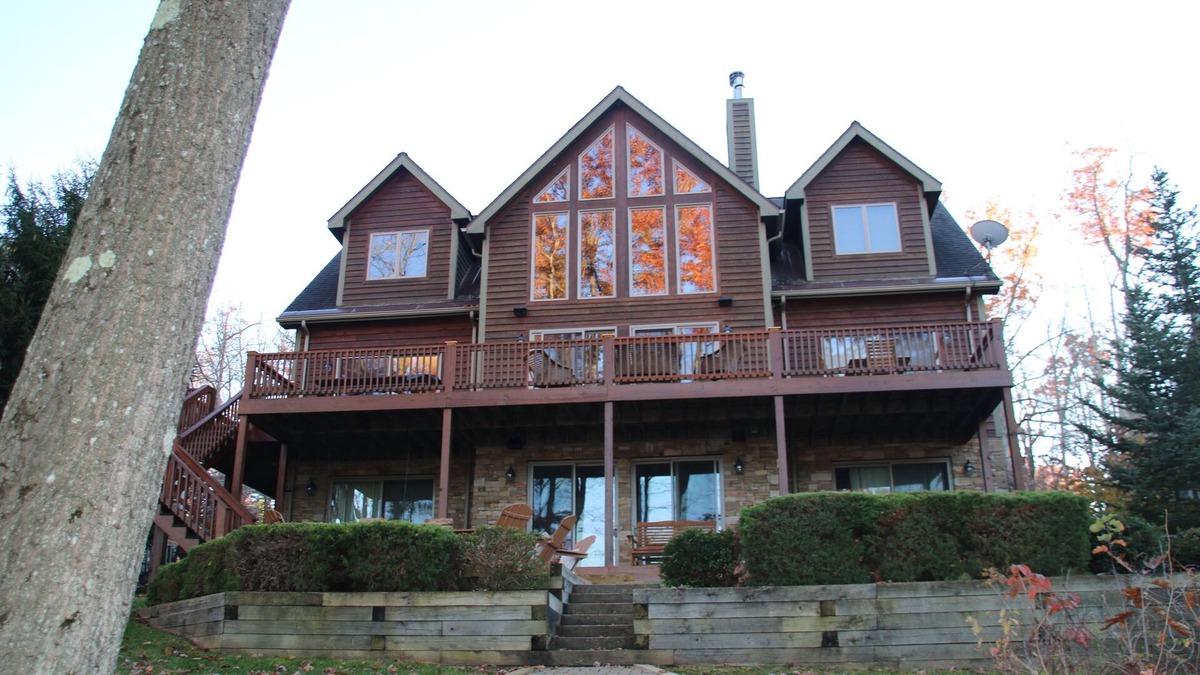 Thayerville House | Stunning 7 Bedroom 6.5 Bath Lakefront Home with Dock Slip