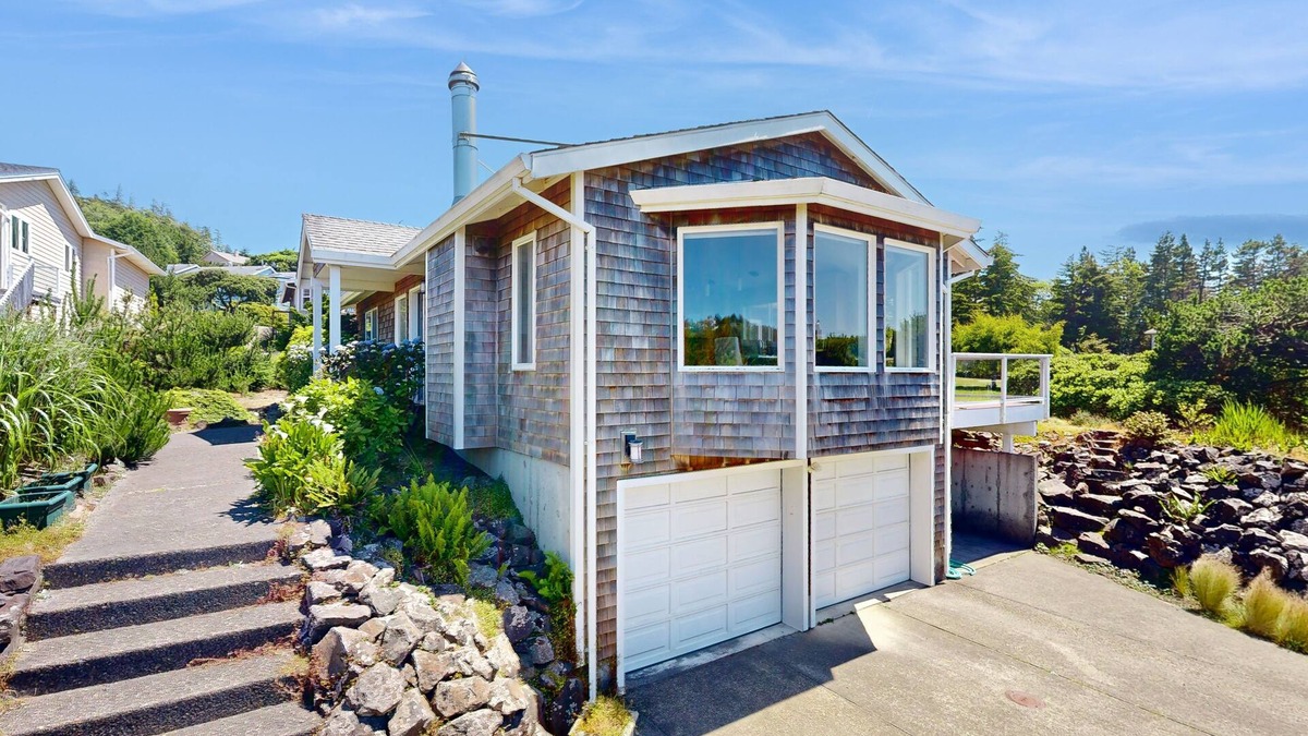 Oceanside House | Stunning coastal home with ocean views, firepit & media room - walk to beach