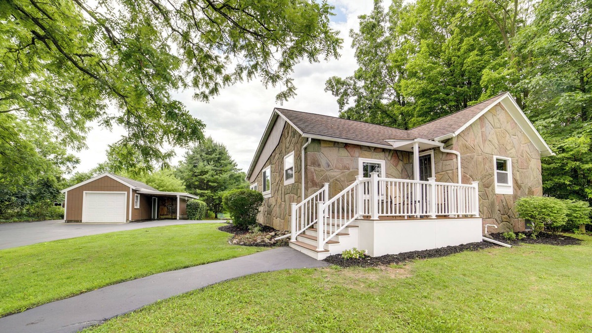 East Lansing House | Stunning East Lansing Retreat w/ Fire Pit!