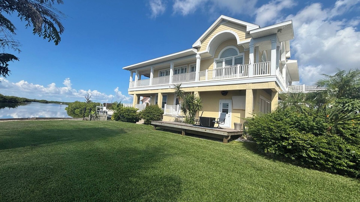 Tampa House | Stunning Key West Style Waterfront Home with Exceptional Views!
