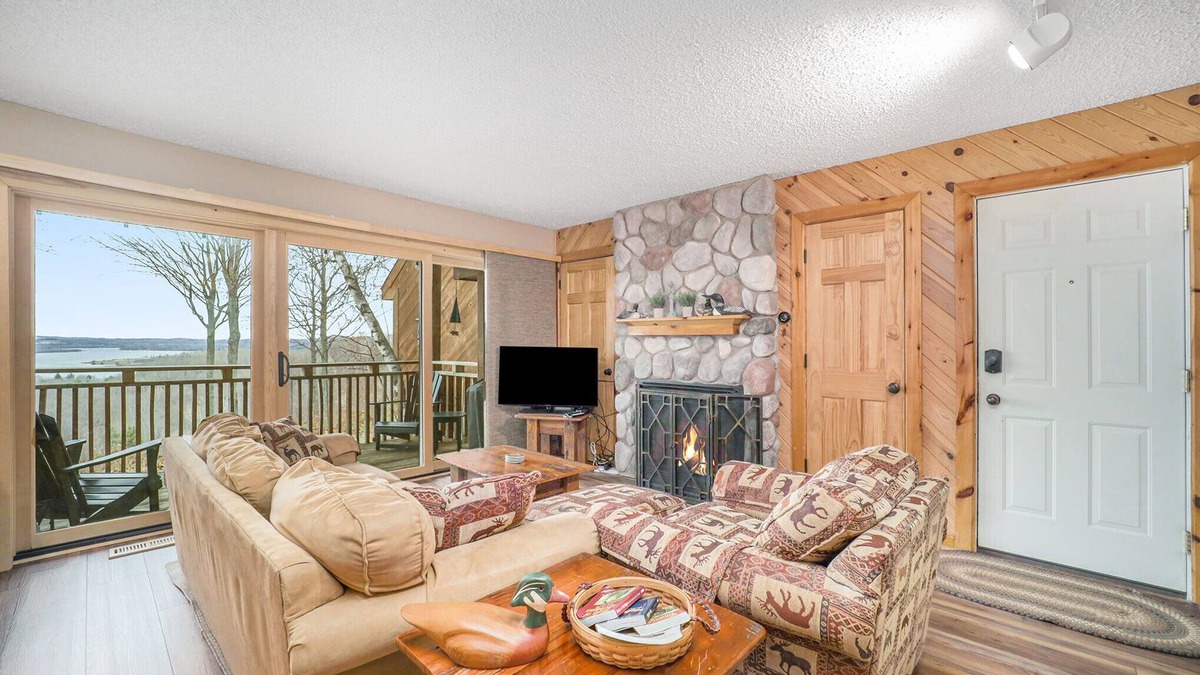 Bellaire Condo | Stunning Lake Bellaire Views! 2 Bedroom Condo in Summit Village
