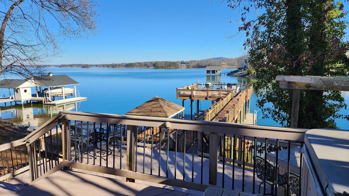 Penhook House | Stunning lake front with private dock and pontoon boat available for rent