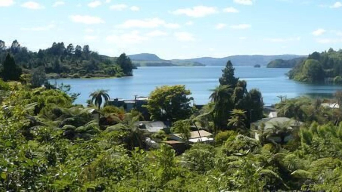 Okere Falls House | Stunning lake view plus either jetty space or on the water boatshed