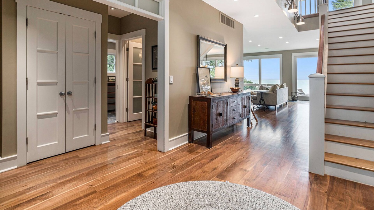 Michiana House | Stunning lakefront home & guest house with pool, beach, terraces, & views