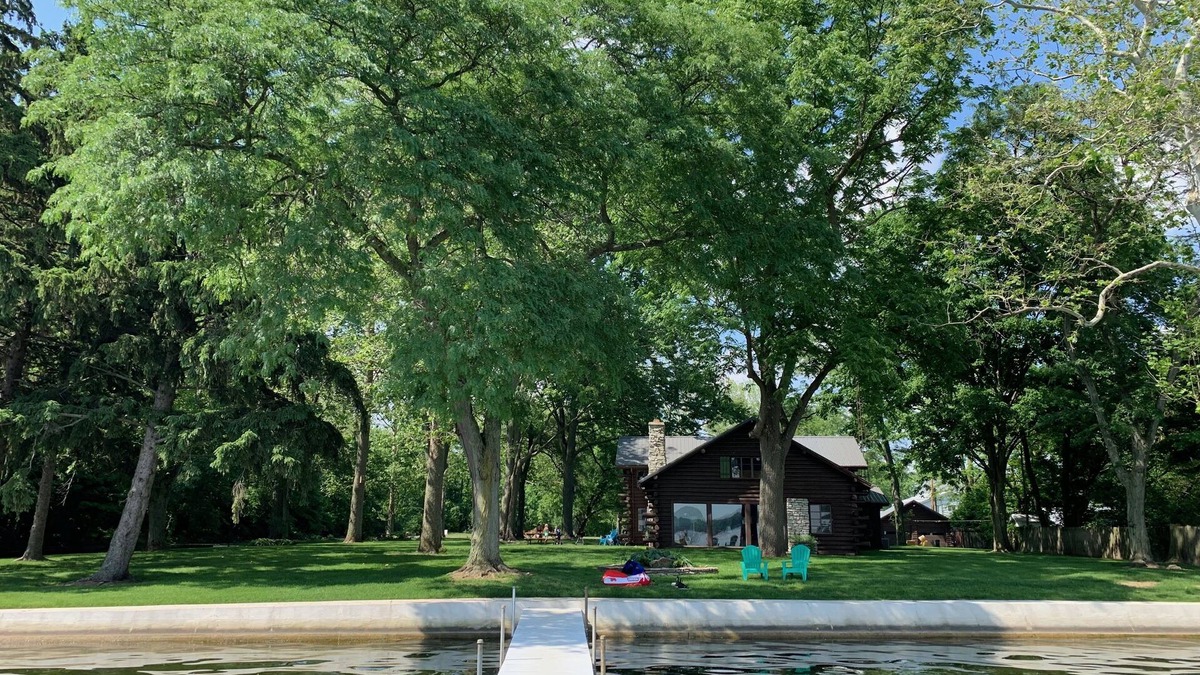 Enchanted Hills House | Stunning lakefront log cabin on a private acre