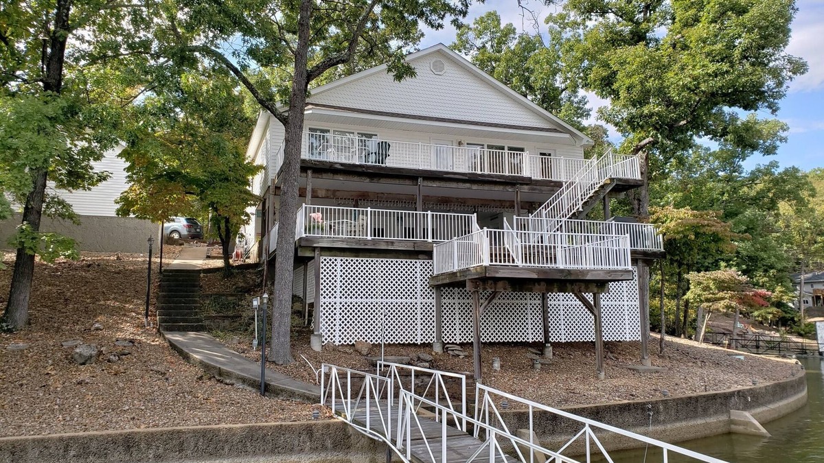 Lake Ozark House | Stunning lakefront! Swim safe cove, Huge pvt Deck & Dock - 3 homes available