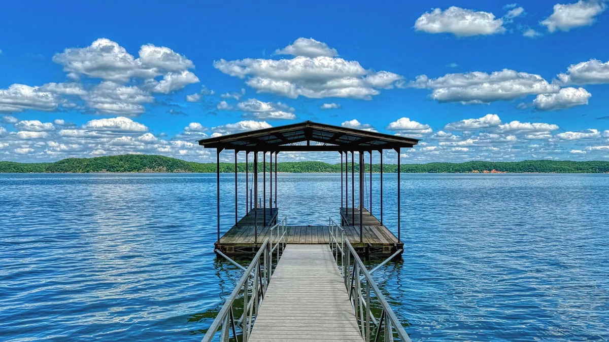 New Concord House | Stunning lakefront home with private dock, screened in porch and firepit