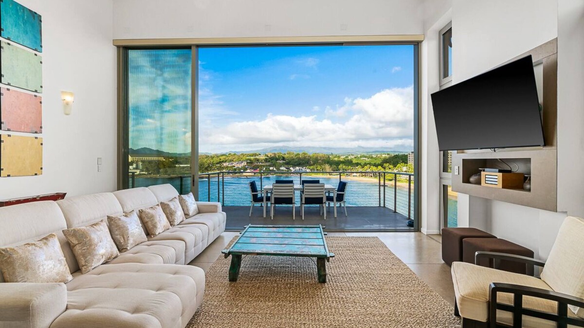 Lihue Apartment | Stunning Oceanfront Penthouse, 14' ft Ceilings and Wall-to-Wall Glass Slider.