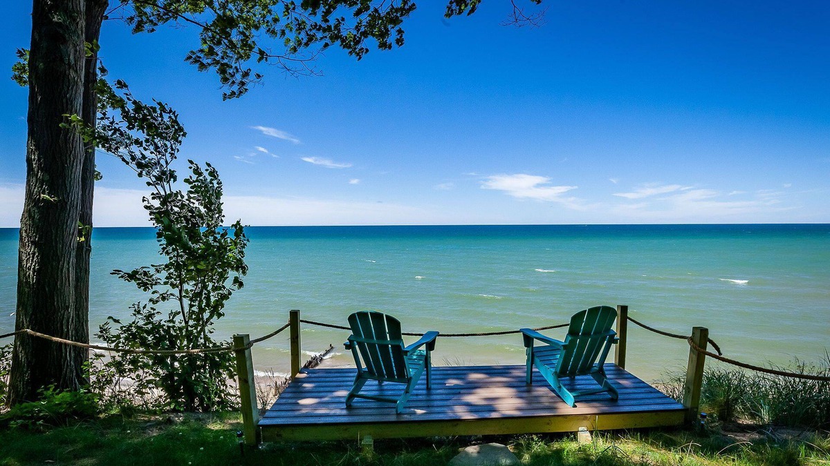 Montague House | Stunning renovated cottage with 150' of private sandy Lake Michigan beachfront!