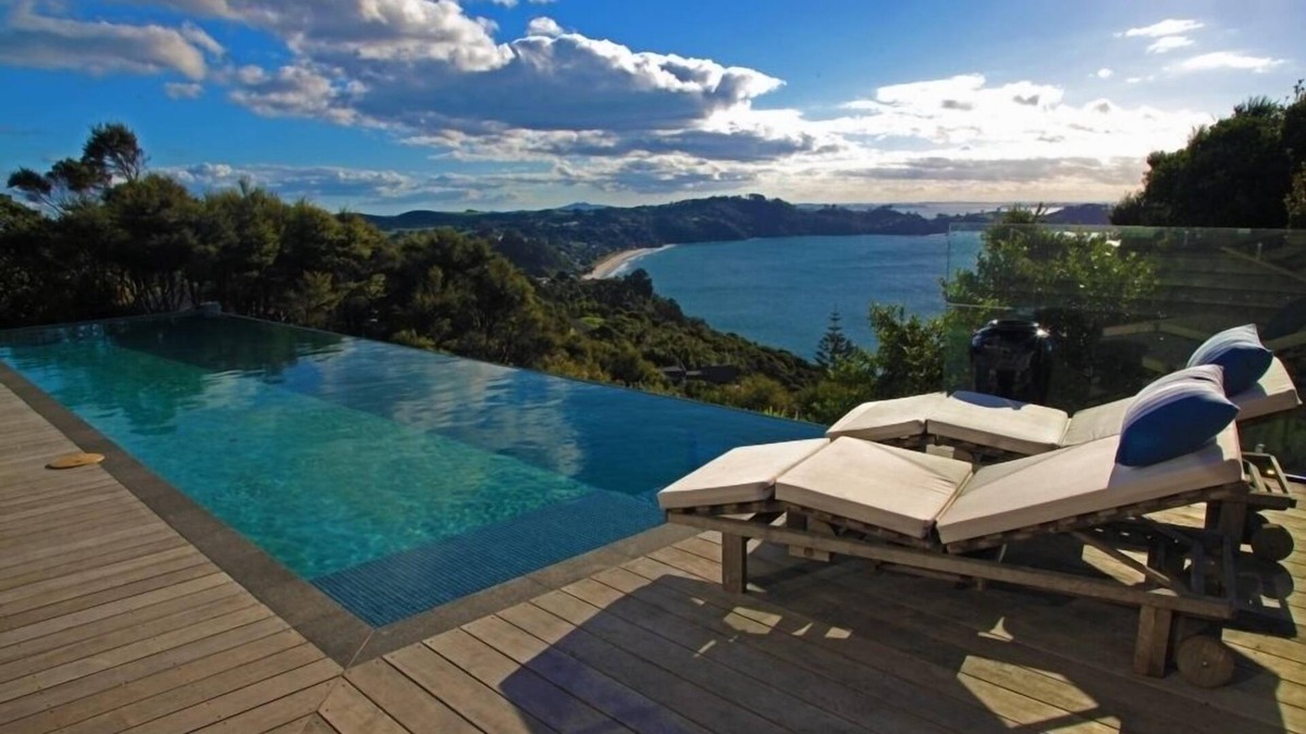 Waiheke Island House | Stunning, sunny Cape Cod hilltop retreat - beautiful pool and sweeping gardens